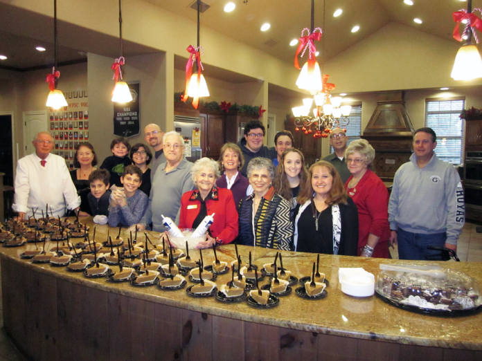 San Antonio volunteers preparing a meal for soldiers at Brooke Army Medical Center